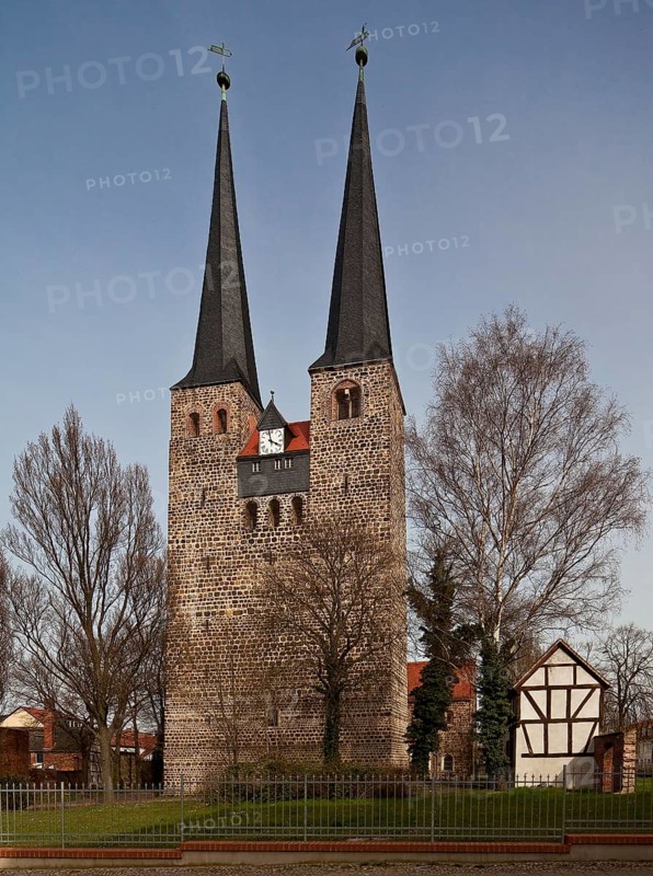 Burg near Magdeburg, lower church of St Nicolai. from the west, double tower complex with multiple steps made of excellently executed granite masonry 12th century spires late medieval, St., Sankt, Saint