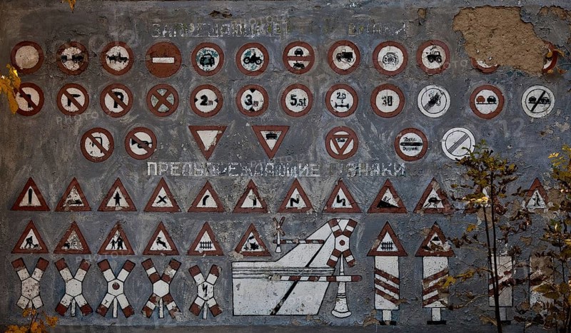Wall painting with traffic signs to inform military drivers