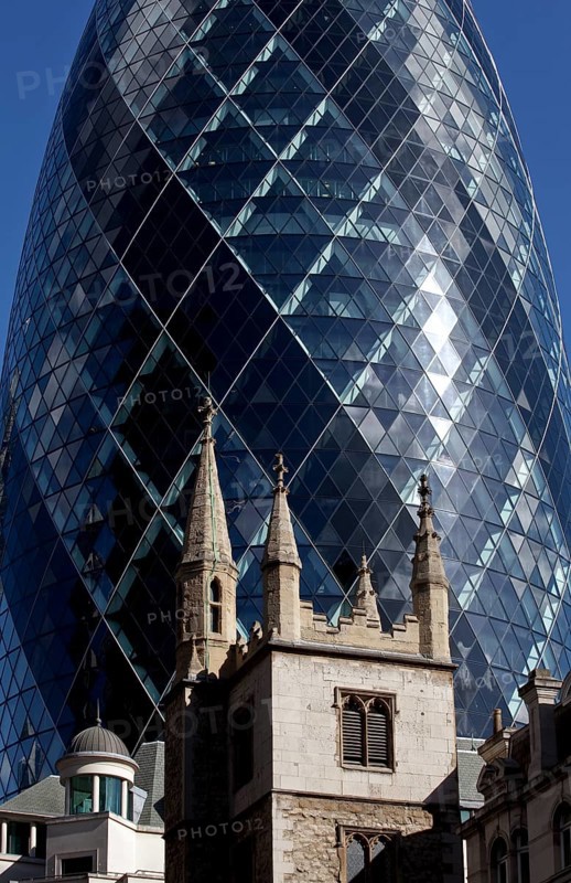 Office tower 180 m by Norman Foster 2001-04, in front of it tower of St Andrew Undershaft Church, St., Saint, Saint