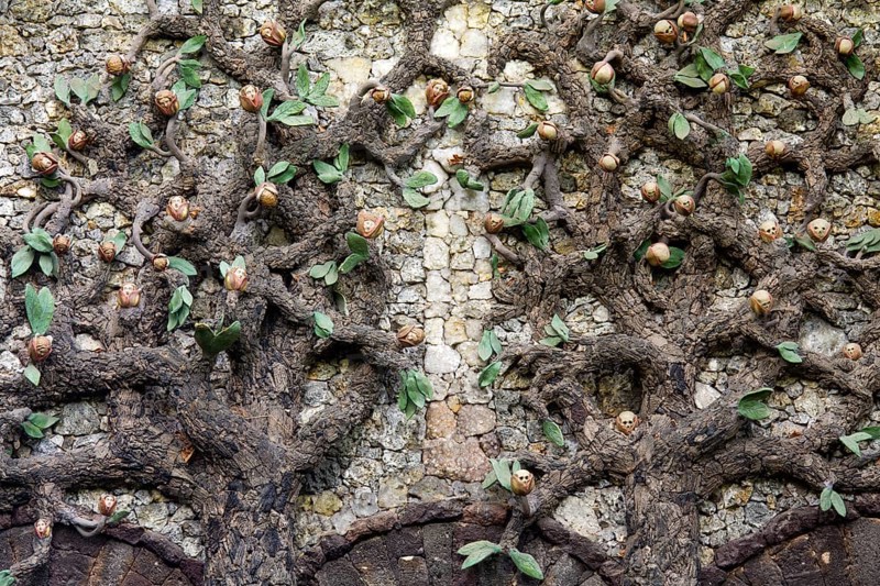 Garden of Redemption, chapel with the theme of redemption from evil, gable field with two trees of paradise, the tree of life with angel heads instead of apples and, as a counterpart, the tree of knowledge bearing skulls, St., Sankt, Saint