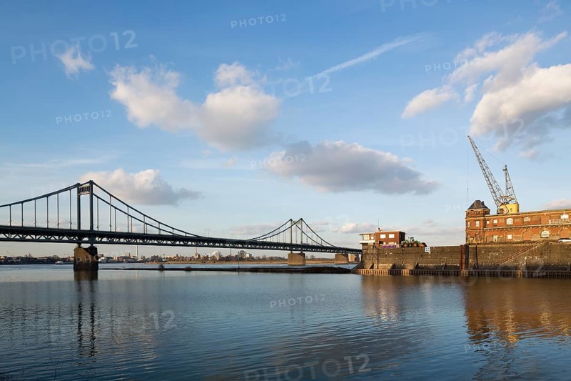 Krefeld-Ürdingen, Rhine harbour, warehouses and Rhine bridge