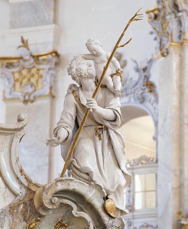 St Christopher. The Vierzehnheiligen Basilica near Bad Staffelstein in the district of Lichtenfels is a pilgrimage church in Upper Franconia. The church, built according to plans by Balthasar Neumann, is dedicated to the Fourteen Saint Helpers and receives around half a million visitors a year