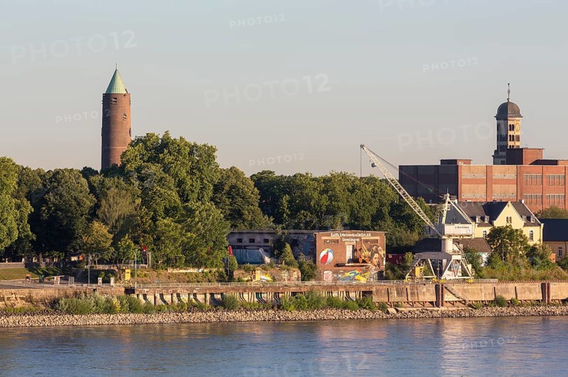 Krefeld, Ürdingen, view from the Krefeld Rhine Bridge to the Rhine Side Gallery at the Zollhof, behind it the tower of St Michael's Church (left) and St Heinrich's Church