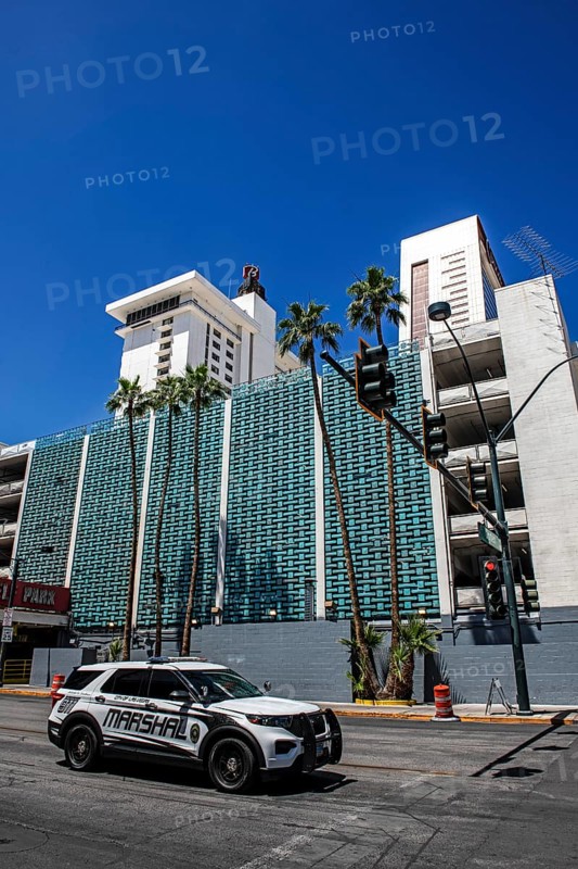Marshal patrols in front of Art Deco façade, car park of Binions Casino Hotel, Downtown, Las Vegas, Nevada, USA, North America