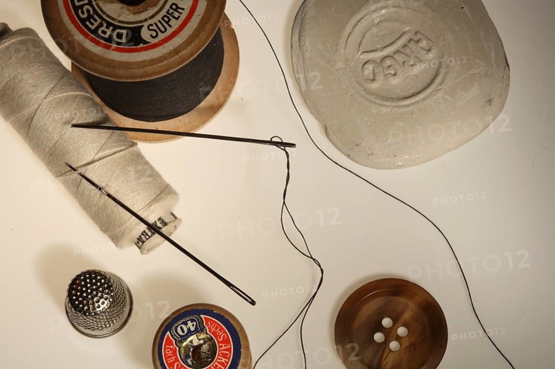 Sewing supplies, needle, thimble, button, knob, ? pin?, sewing thread, sewing-thread, sew on button, sew, tailor's chalk