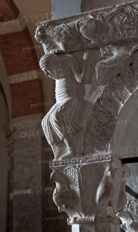 Italy Milan Milan Church of San Ambrogio 12th century Marble pulpit composed of Romanesque spolia SW corner lion-carrying atlant on eagle capital standingl, St., Saint, Saint