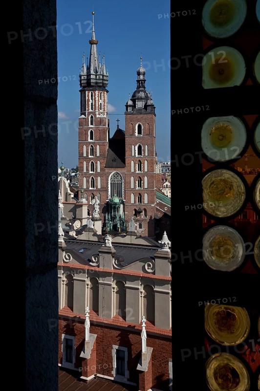View through a coloured glass window of the town hall tower to St. Mary's Church, below Tuchhallen, St., Sankt, Saint