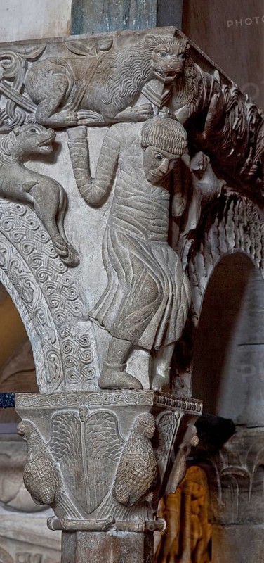 Italy Milan Milan Church of San Ambrogio 12th century Marble pulpit composed of Romanesque spolia SW corner lion-carrying atlant on eagle capital standingl, St., Saint, Saint