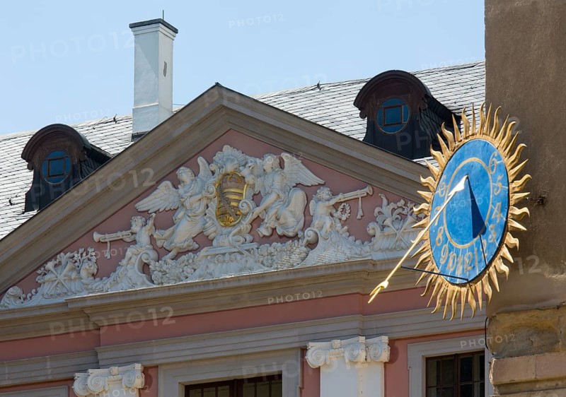 Castle courtyard, sundial and baroque pediment