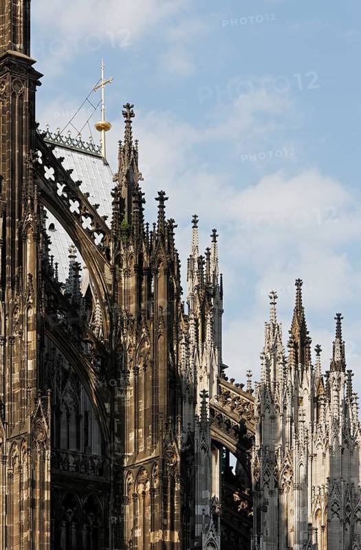 Buttress south of the choir with medieval gilded cross, St., Sankt, Saint