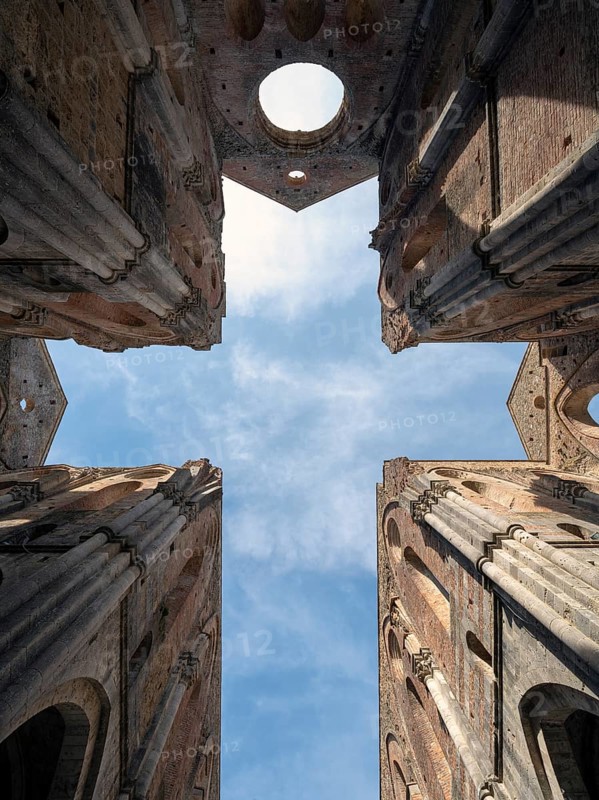 San Galgano, Cistercian monastery ruins, view upwards from the crossing, with cross-shaped section of the sky