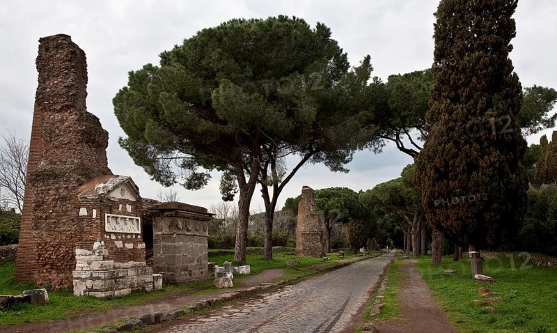 Street scene, far left Tomba dei Festoni