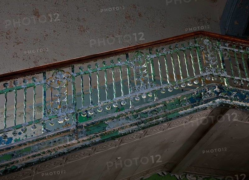 Pavilion for men, staircase railing detail with peeling paint