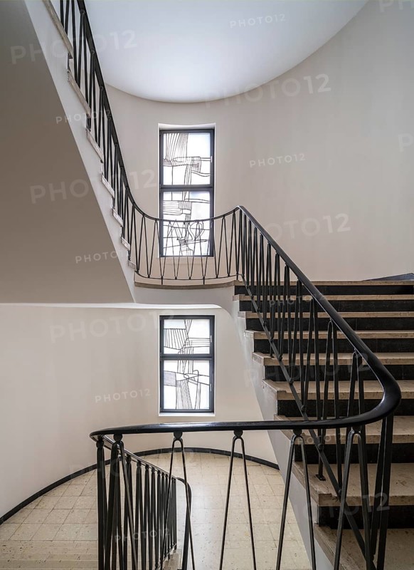 Krefeld, Ürdingen, Meistermann House, former Protestant parish hall. Staircase with glass window by Georg Meistermann 1961