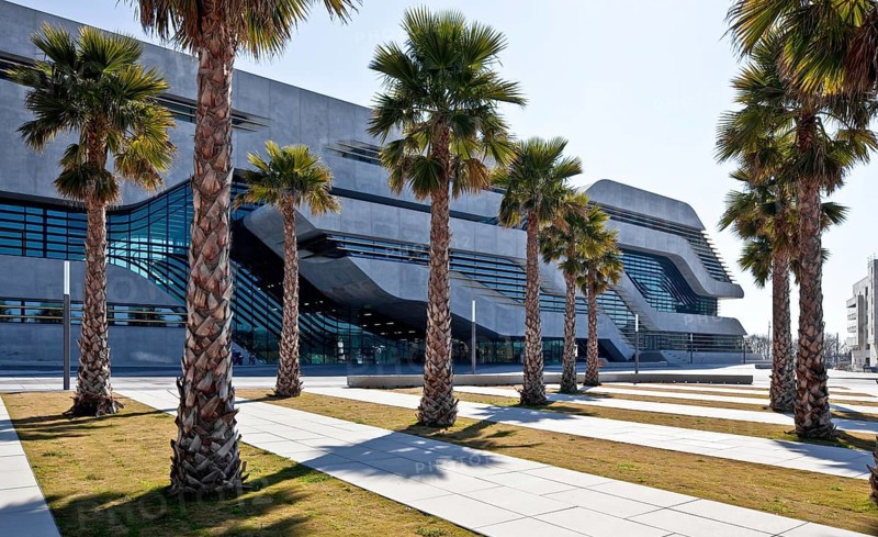 Montpellier, multi-purpose building PIERRESVIVES, built 2006-2012 by Zaha Hadid, main entrance side with palm trees