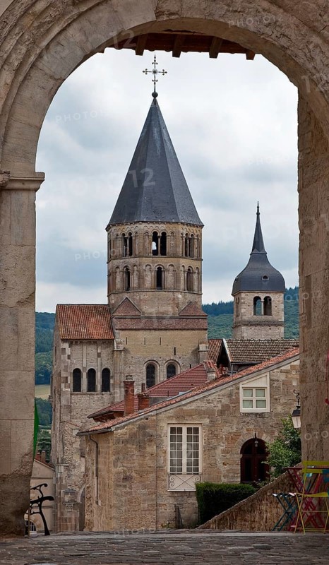 Cluny, former Benedictine abbey, remains of the abbey church Sts-Pierre-et-Paul, begun in 1088, so-called holy water tower of the south transept, clock tower on the right, view through the west portal reconstructed elsewhere, St., Saint, Saint