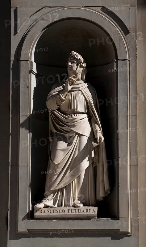 Sculpture by Francesco Petrarca on the façade