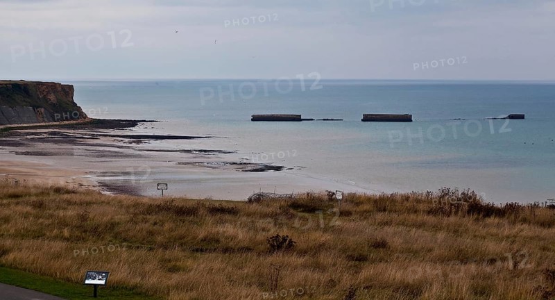 Channel coast with relics of the allied MULBERRY landing party on the sixth of June 1944, so-called D-Day