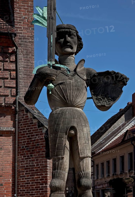 General view en face in front of the arcade wing of the town hall, built in 1525, copy 1974 with wooden (!) pointing sword, height 7.80 metres