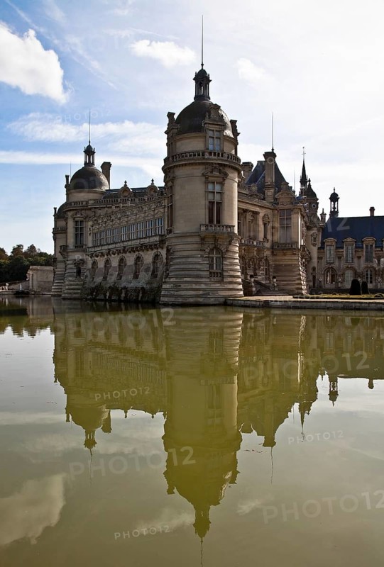 France Chantilly Castle 65808 Large castle View from north-west 1875-81 built by HonorŽ Daumet right Small castle begun in 1560 by Jean Bullant