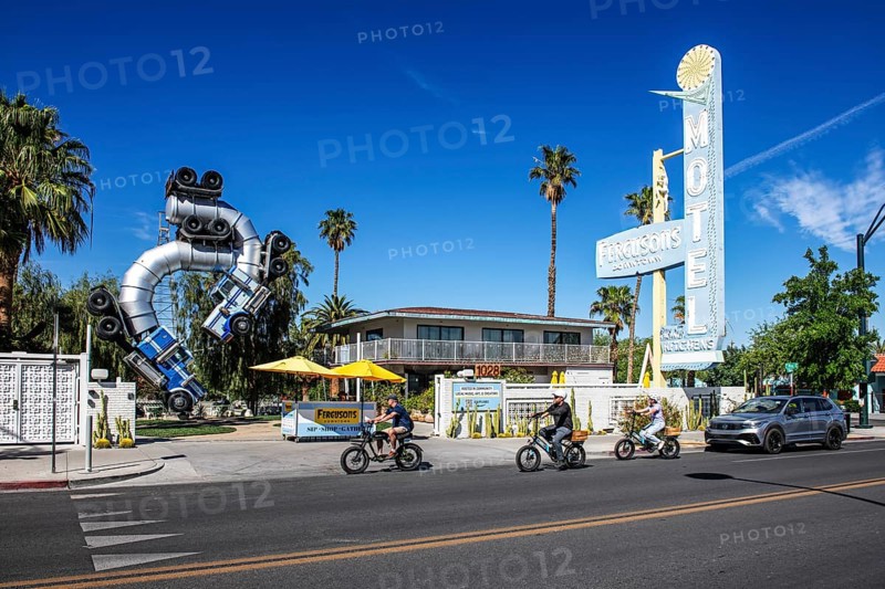 Cyclist in front of truck artwork, Fergusons Motel, Las Vegas, Nevada, USA, North America