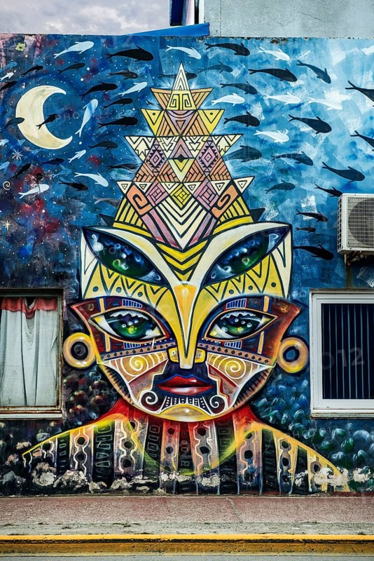 Mural with indigenous artwork of the natives, harbour of Ushuaia, Argentina, South America
