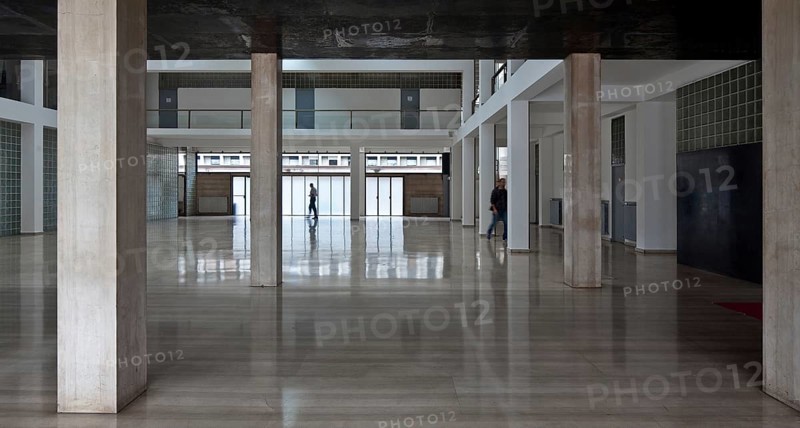 Italy Como Casa del Fascio 88660 by Guiseppe Terragni 1932-36 built as a party house in the style of Razionalismo today tax office west façade 33, 2 m long 16, 6 m high. Interior