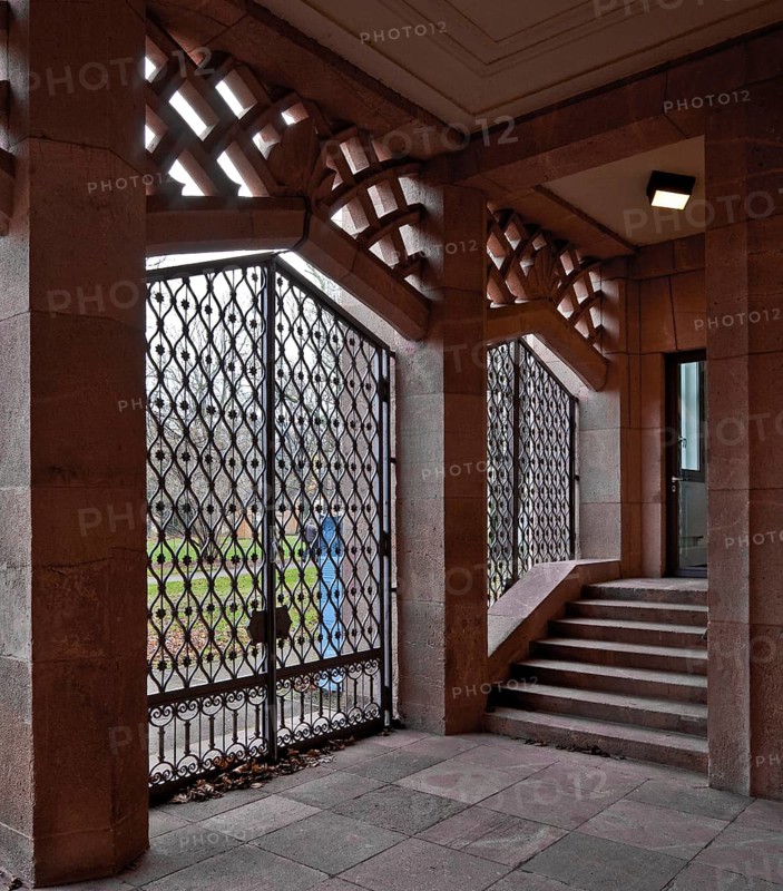 Built in 1925-29, passageway in the east wing with a view of the Old St John's Cemetery
