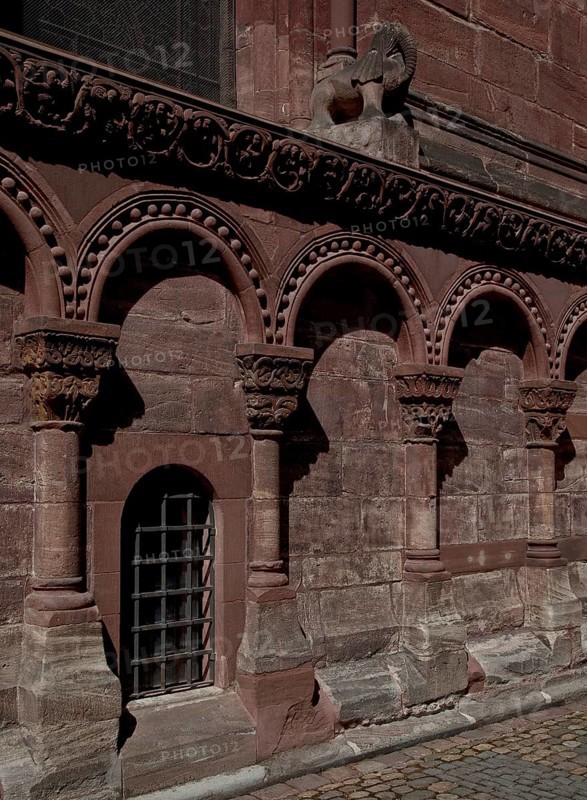Base area at the choir with Romanesque arcade and elephant sculpture, St., Sankt, Saint