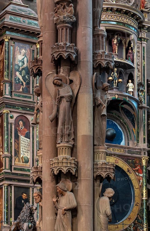 Strasbourg Cathedral, Cathédrale Notre-Dame de Strasbourg, southern transept arm, astronomical clock and in front of it the angel pillar (pillar of the Last Judgement)