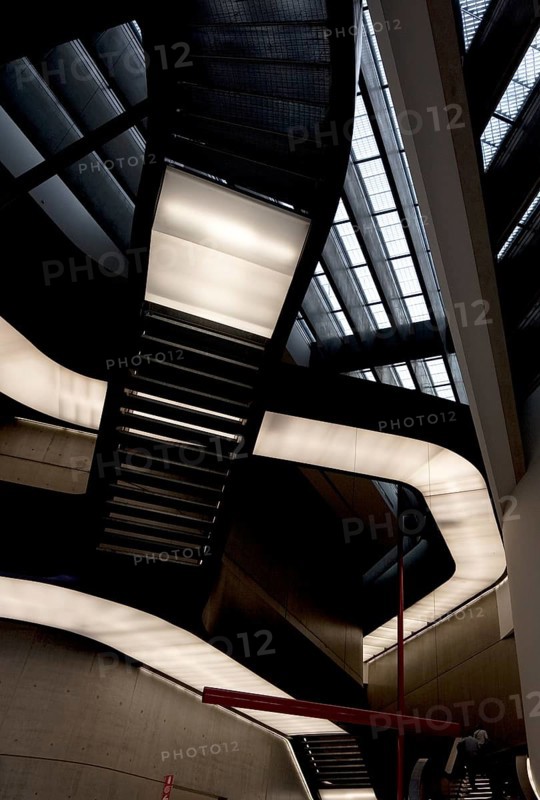 Museo nazionale delle arti del XXI secolo, completed in 2010 by Zaha Hadid, staircases in the vestibule, view from below
