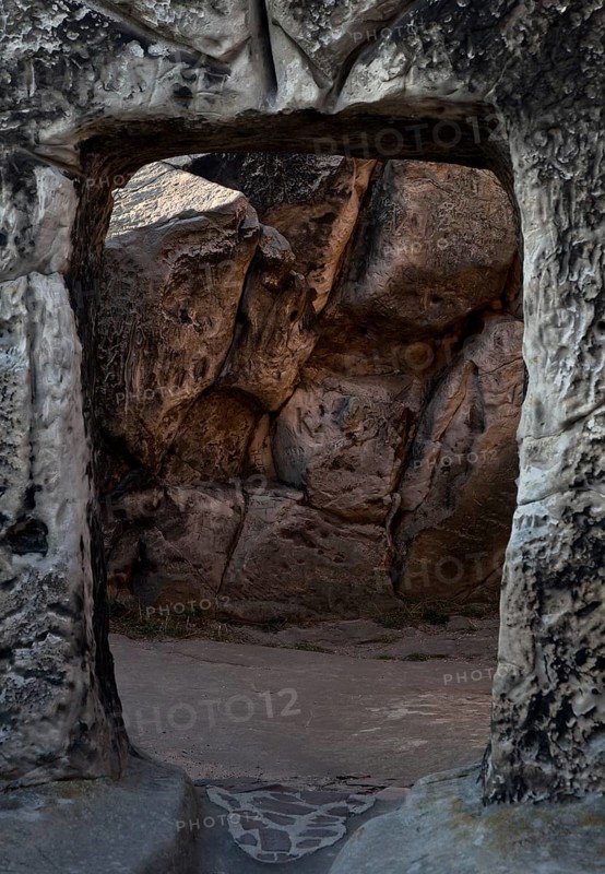 Artificial cave rooms, portal chiselled out of the bedrock