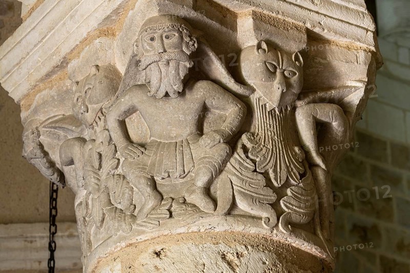Neuvy-Saint-Sépulchre, collegiate church of St-Jacques, rotunda, column capitals, bearded men with mythical creatures