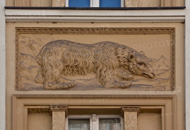 Stucco relief of a bear, relief possibly early modern, façade ca. mid-19th cent