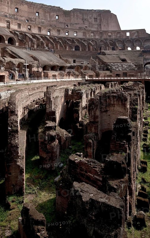 Interior with wall remains below the former arena