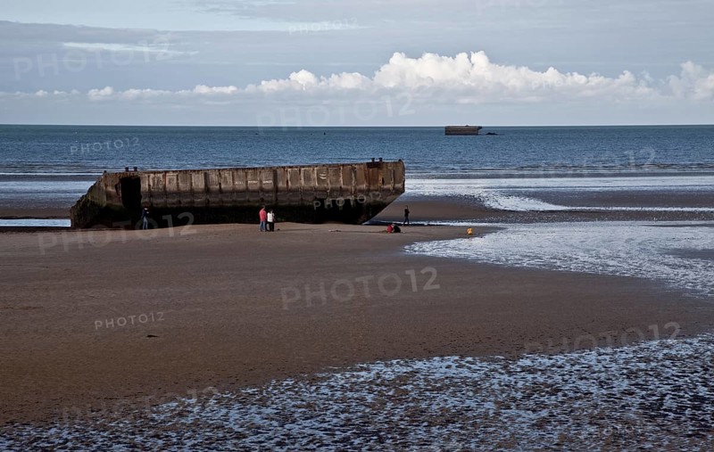 Channel coast with relics of the allied MULBERRY landing party on the sixth of June 1944, so-called D-Day