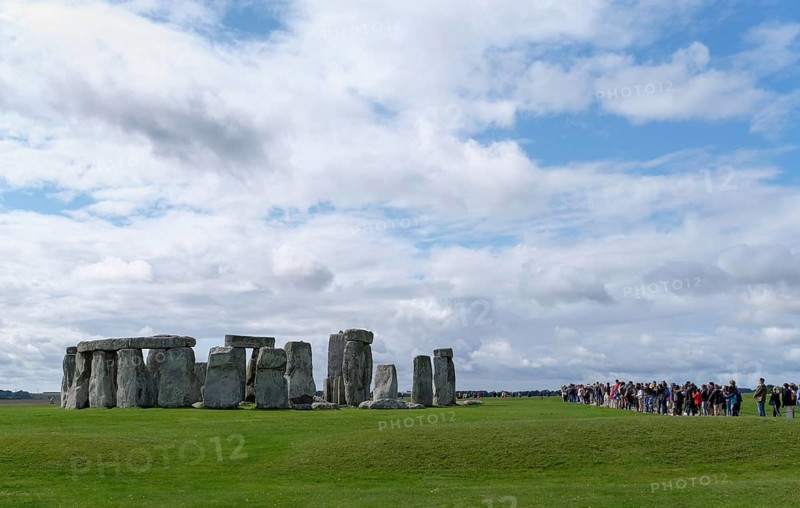 Stonehenge, prehistoric stone circle with tourists