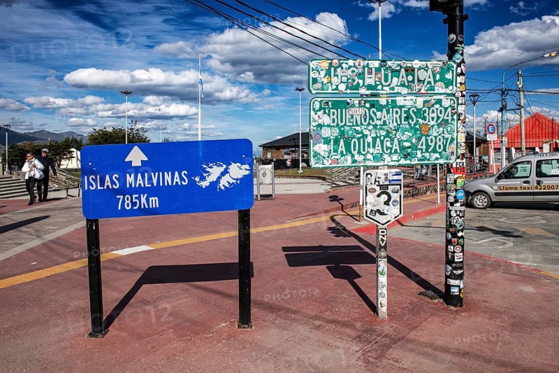 Town sign Ushuaia and distance sign to the Falkland Islands, Argentina, South America