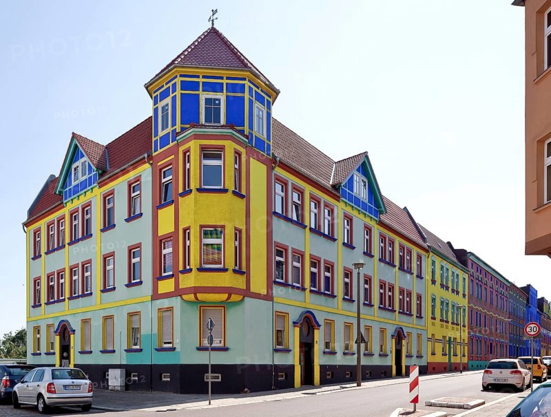 Magdeburg Otto-Richter-Straße southern part with corner house built 1904-16 colourfully redesigned from 1921 by Bruno Taut and Carl Krayl façade reconstruction c a 2005-15
