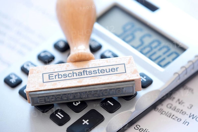 Stamp with the inscription inheritance tax, tax revenue, inheritance, will, assets, taxation