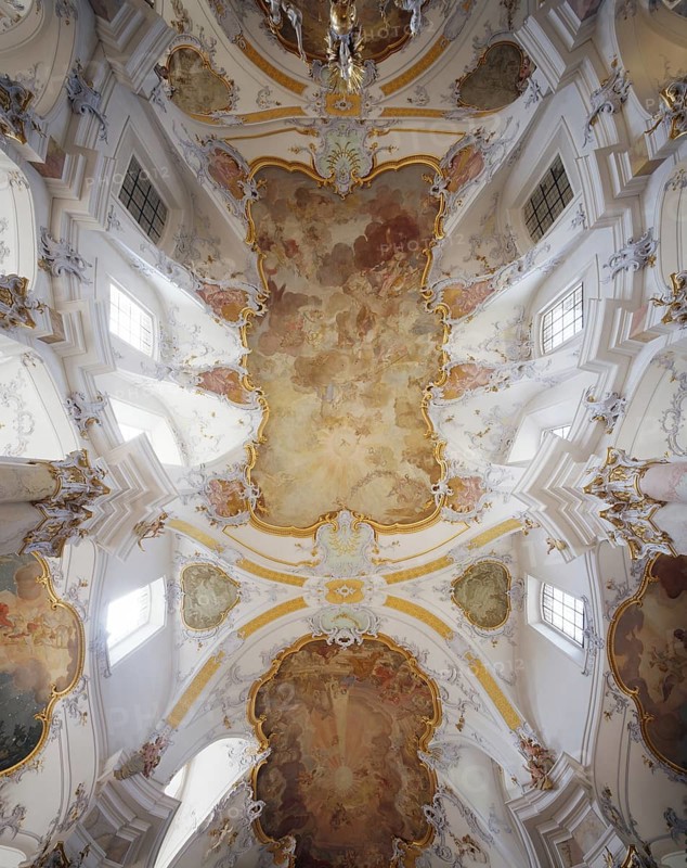 Vaults of the rotunda of grace. The Vierzehnheiligen Basilica near Bad Staffelstein in the district of Lichtenfels is a pilgrimage church in Upper Franconia. The church, built according to plans by Balthasar Neumann, is dedicated to the Fourteen Holy Helpers and receives around half a million visitors a year