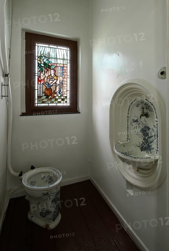 Manufacturer's villa, toilet halfway up the stairs, stained glass window with blacksmith depiction