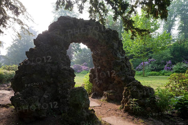 Garden of the Elector, western part designed by Maximilian Friedrich Weyhe in 1807, eastern part remodelled into an English landscape garden in 1840 according to plans by Peter Joseph Lenné. Artificial grotto