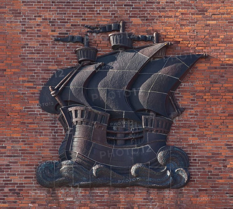 Sailing ship relief around 1930 on a warehouse
