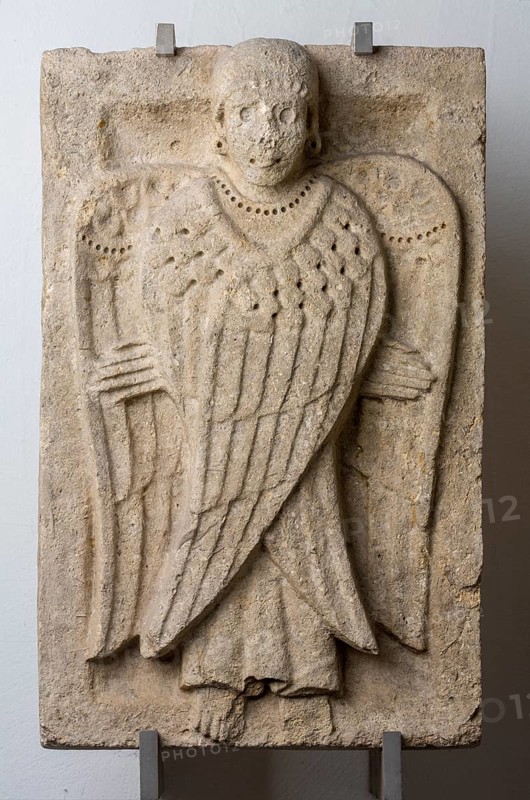 Brauweiler near Pulheim, abbey church of St Nicholas, lapidarium, cherubim from the west gable of the north aisle. 11th-12th century