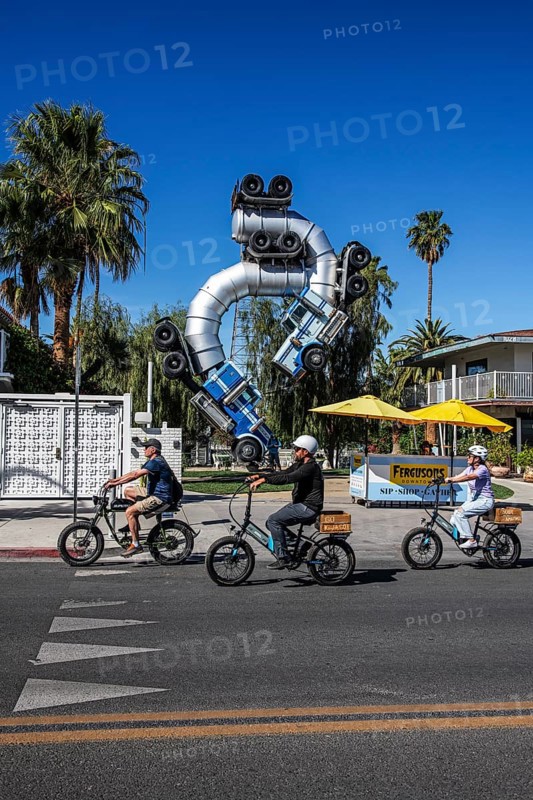 Cyclist in front of truck artwork, Fergusons Motel, Las Vegas, Nevada, USA, North America