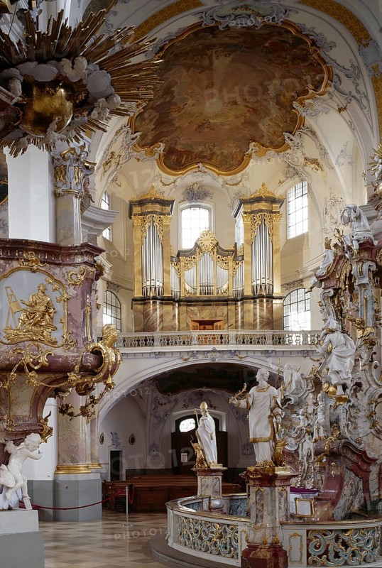 View to the east with the altar of grace and main organ. The Vierzehnheiligen Basilica near Bad Staffelstein in the district of Lichtenfels is a pilgrimage church in Upper Franconia. The church, built according to plans by Balthasar Neumann, is dedicated to the Fourteen Holy Helpers and receives around half a million visitors a year