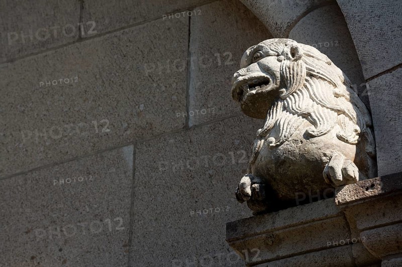 Romanesque lion, Saint, Saint