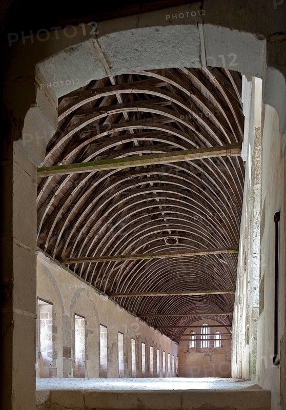 Fontenay former Cistercian monastery dormitory built 12th century interior facing south wooden roof truss 15th century window left later broken in, St., Sankt, Saint