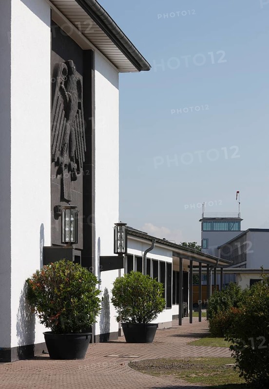 Butzweilerhof, reception building from 1936 with eagle, tower in the background